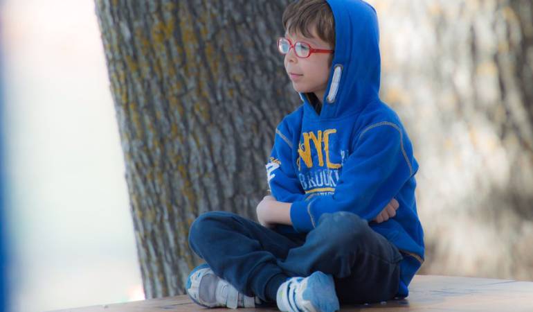 David, de nueve años, está cursando tercero de primaria.