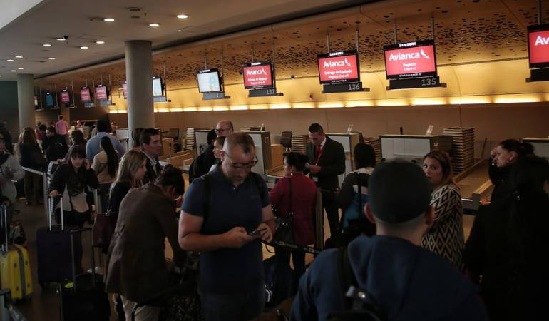 Viajeros en el Aeropuerto El Dorado