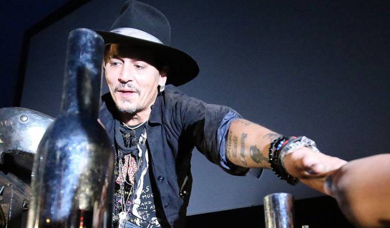 "Esto va a salir en la prensa y será horrible", dijo el actor Johnny Depp en el Festival de Glastonbury, en Reino Unido.