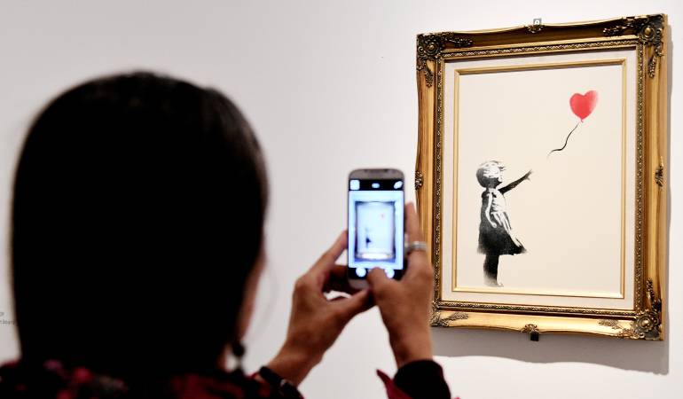 Banksy, Niña con el globo, grafiti, Londres: Un grafiti de Banksy, la obra de arte favorita de los británicos
