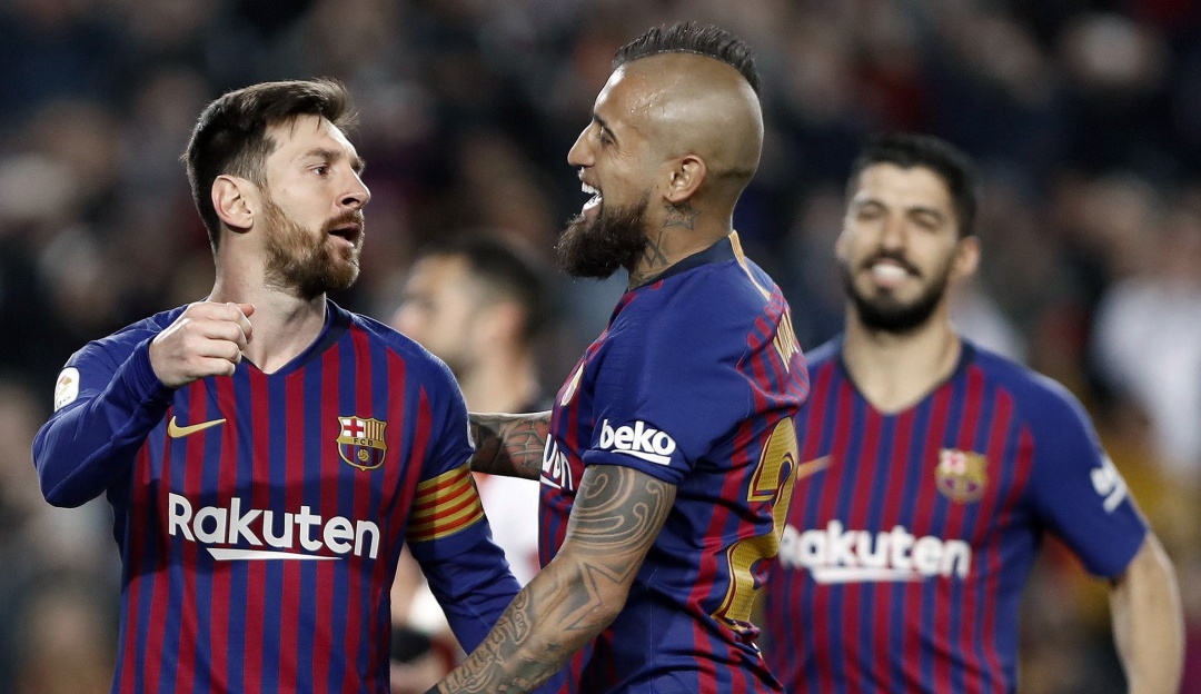 Lionel Messi y Arturo Vidal