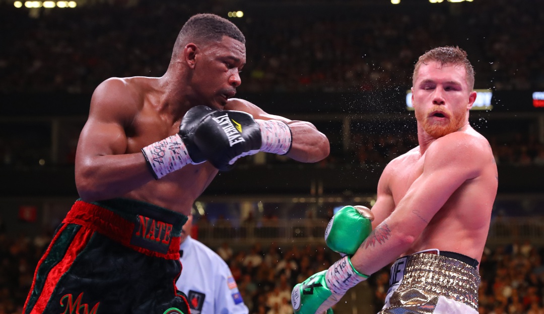 Daniel Jacobs (izquierda) y Canelo Álvarez (Derecha)