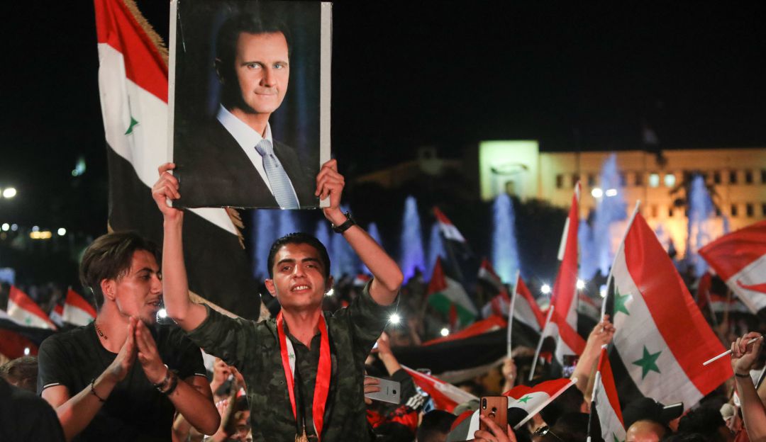 Cientos de seguidores del oficialismo sirio celebraron el triunfo de Bashar al Asad. Cientos de seguidores del oficialismo sirio celebraron el triunfo de Bashar al Asad.