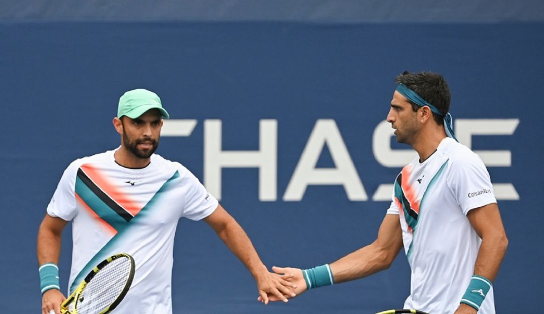 Cabal y Farah festejan un punto durante su partido del debut en el US Open 2021. Cabal y Farah festejan un punto durante su partido del debut en el US Open 2021.