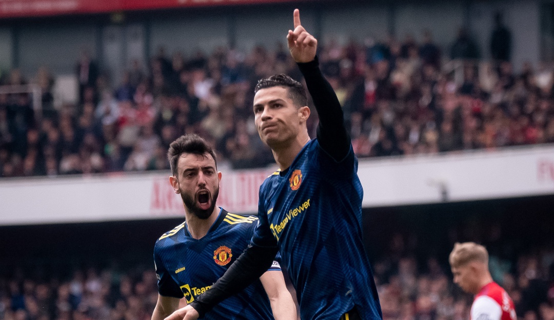 Cristiano Ronaldo festeja su gol ante el Arsenal, el número 100 en la Premier League. Cristiano Ronaldo festeja su gol ante el Arsenal, el número 100 en la Premier League.