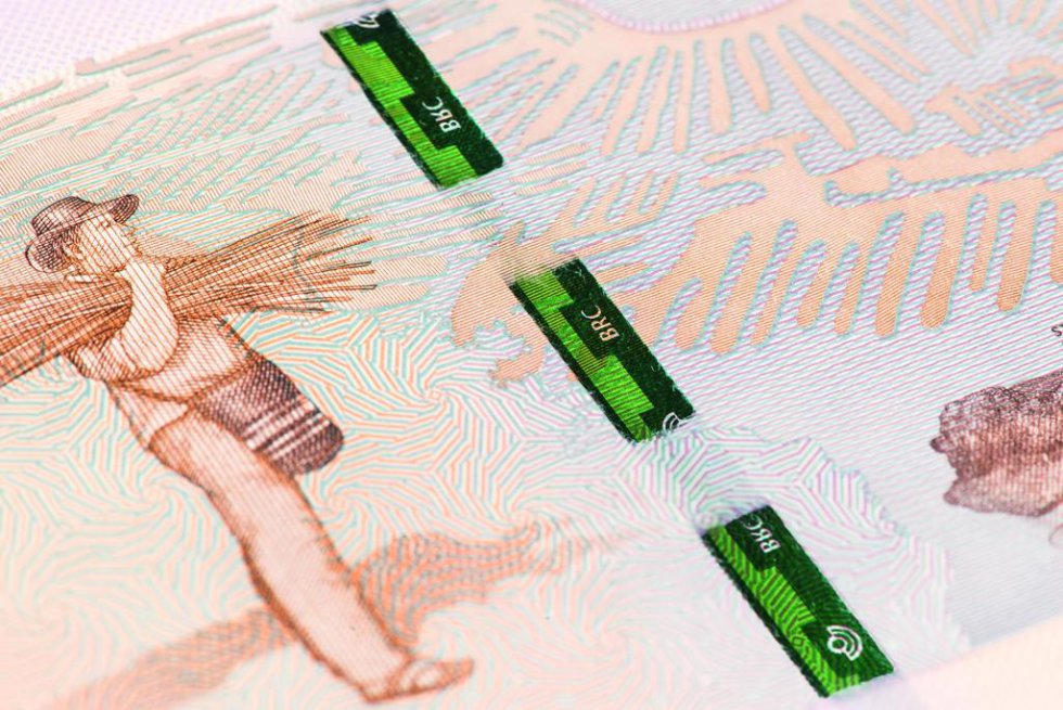 En el billete aparece representado un campesino costeño cargando caña flecha, materia prima para la elaboración del emblemático sombrero vueltiado. En el billete aparece representado un campesino costeño cargando caña flecha, materia prima para la elaboración del emblemático sombrero vueltiado.