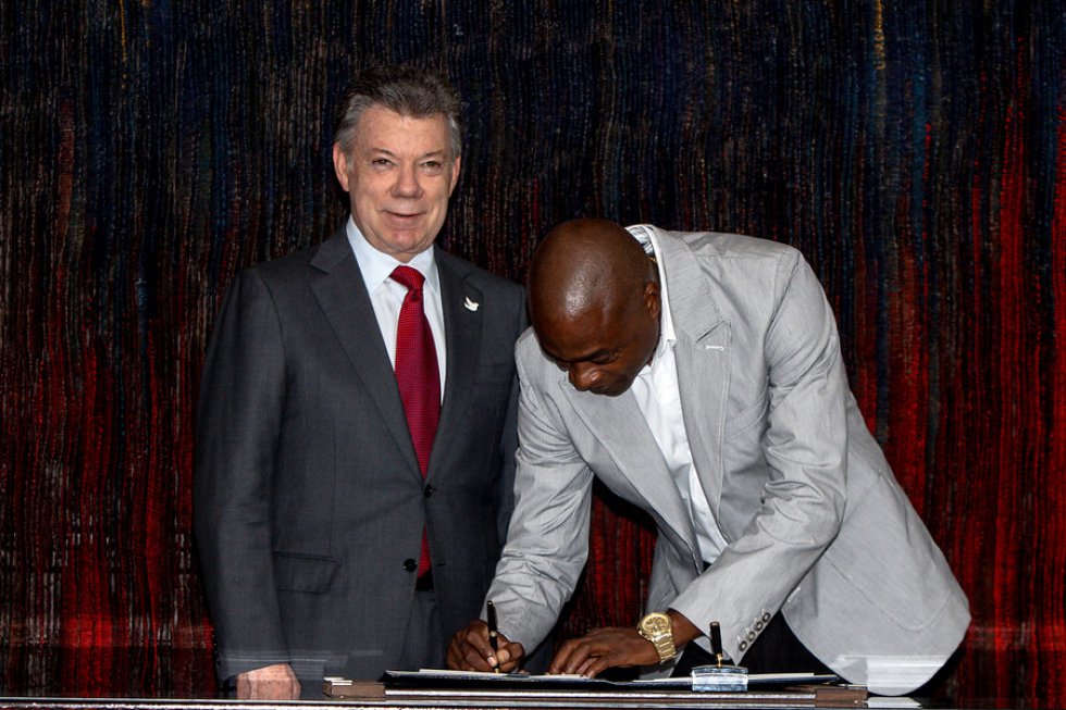 Juan Manuel Santos junto a Ubaldo Duany, técnico de Caterine. Juan Manuel Santos junto a Ubaldo Duany, técnico de Caterine.